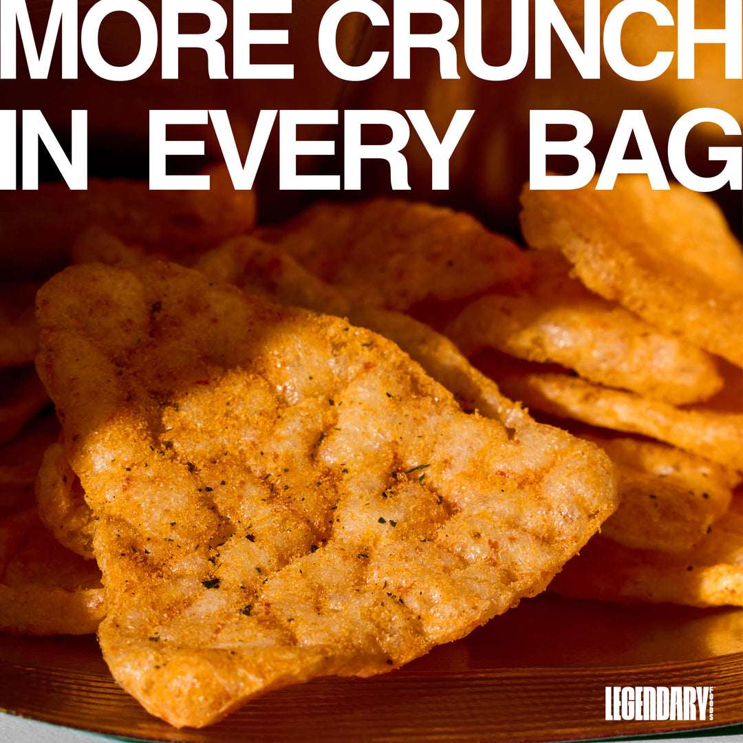 Close-up of Jalapeño Cheddar protein chips with text "More Crunch In Every Bag."