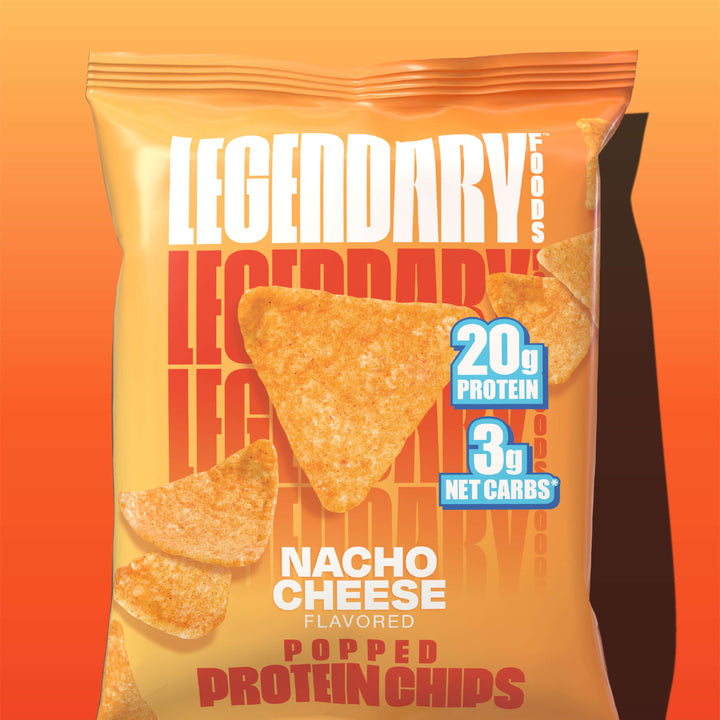 Single bag of Legendary Foods Nacho Cheese Popped Protein Chips against an orange gradient background, showing 20g protein and 3g net carbs.