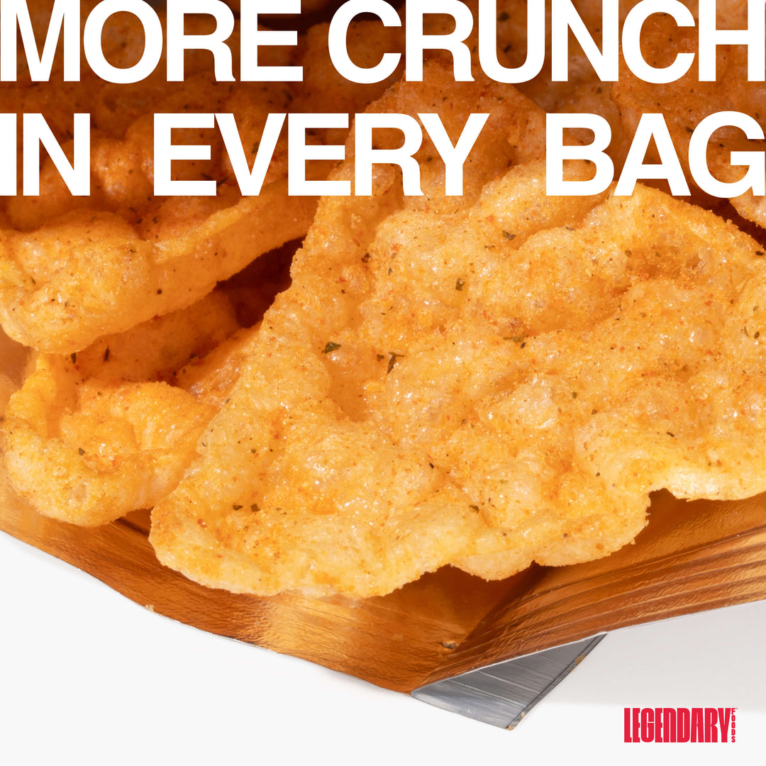 Close-up of Pizza protein chips inside a bag with bold text saying "More Crunch In Every Bag."