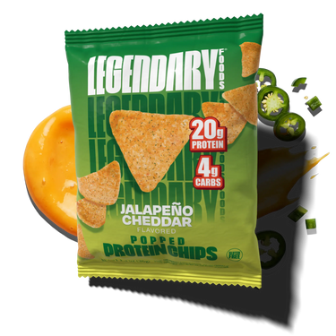 Package of Legendary Foods Jalapeño Cheddar flavored popped protein chips with cheese and jalapeno slices in the background.