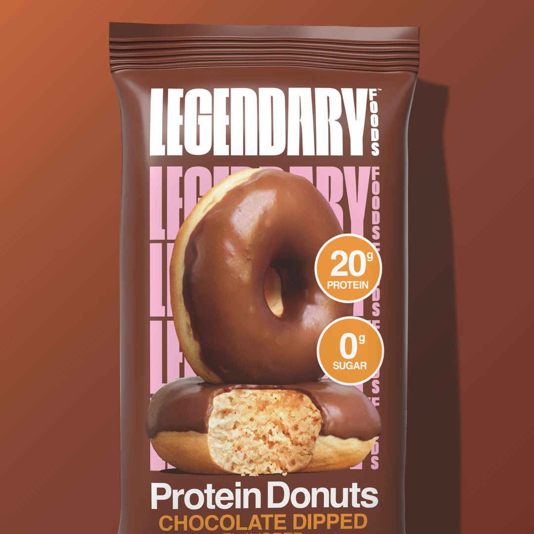 Close-up of a pouch of Legendary Chocolate Dipped Protein Donuts showing donut image and 20g protein, 0g sugar callouts.