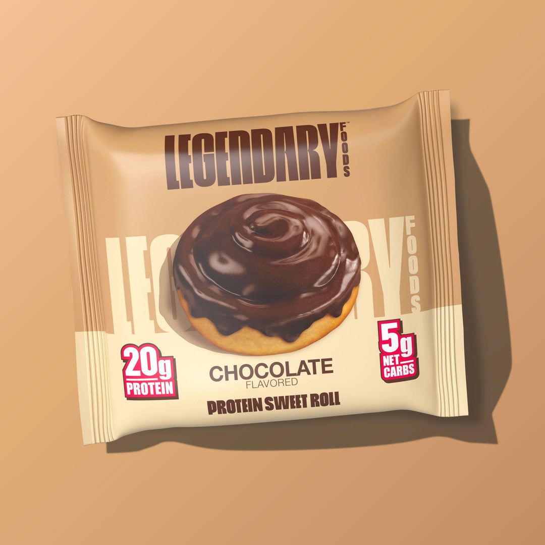 Packaged Chocolate Protein Sweet Roll with swirl frosting. Text: "20g Protein, 5g Net Carbs."