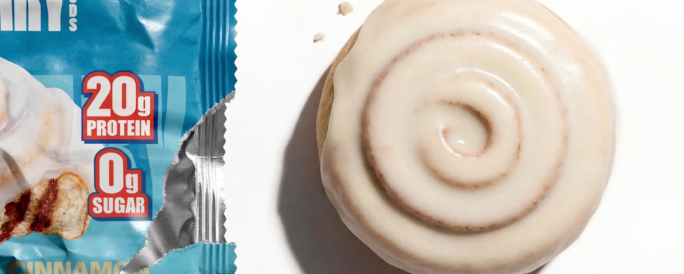 Open wrapper of Cinnamon protein sweet roll with an out-of-package cinnamon protein sweet roll next to it.