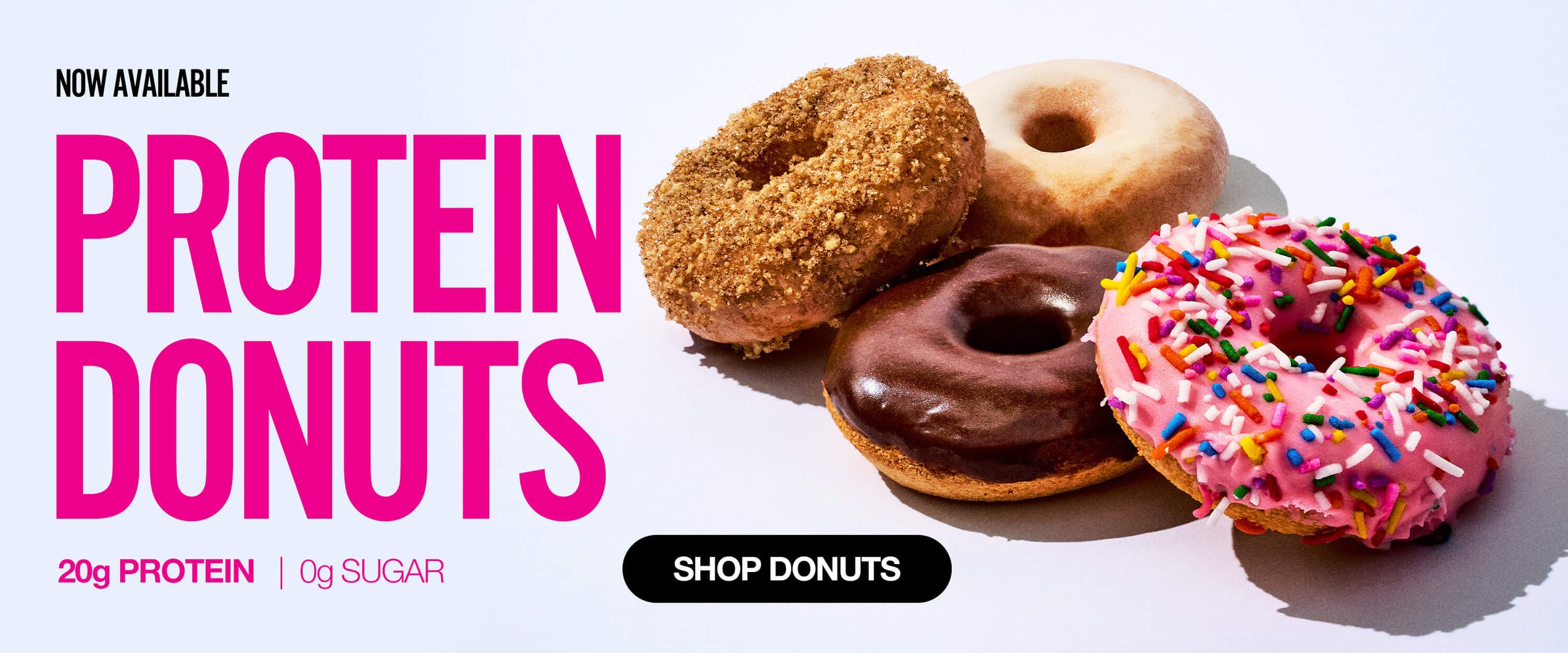 Four colorful protein donuts with frosting and sprinkles beside bold text reading 'Protein Donuts – 20g protein, 0g sugar.'