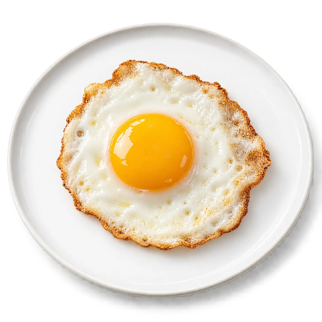 image of an egg on a white plate