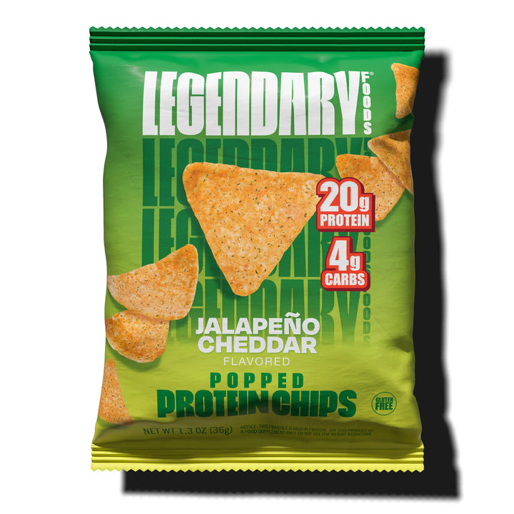 Front of a Legendary Foods Jalapeño Cheddar Protein Chips bag with popped chips, featuring 20g protein and 4g carbs.