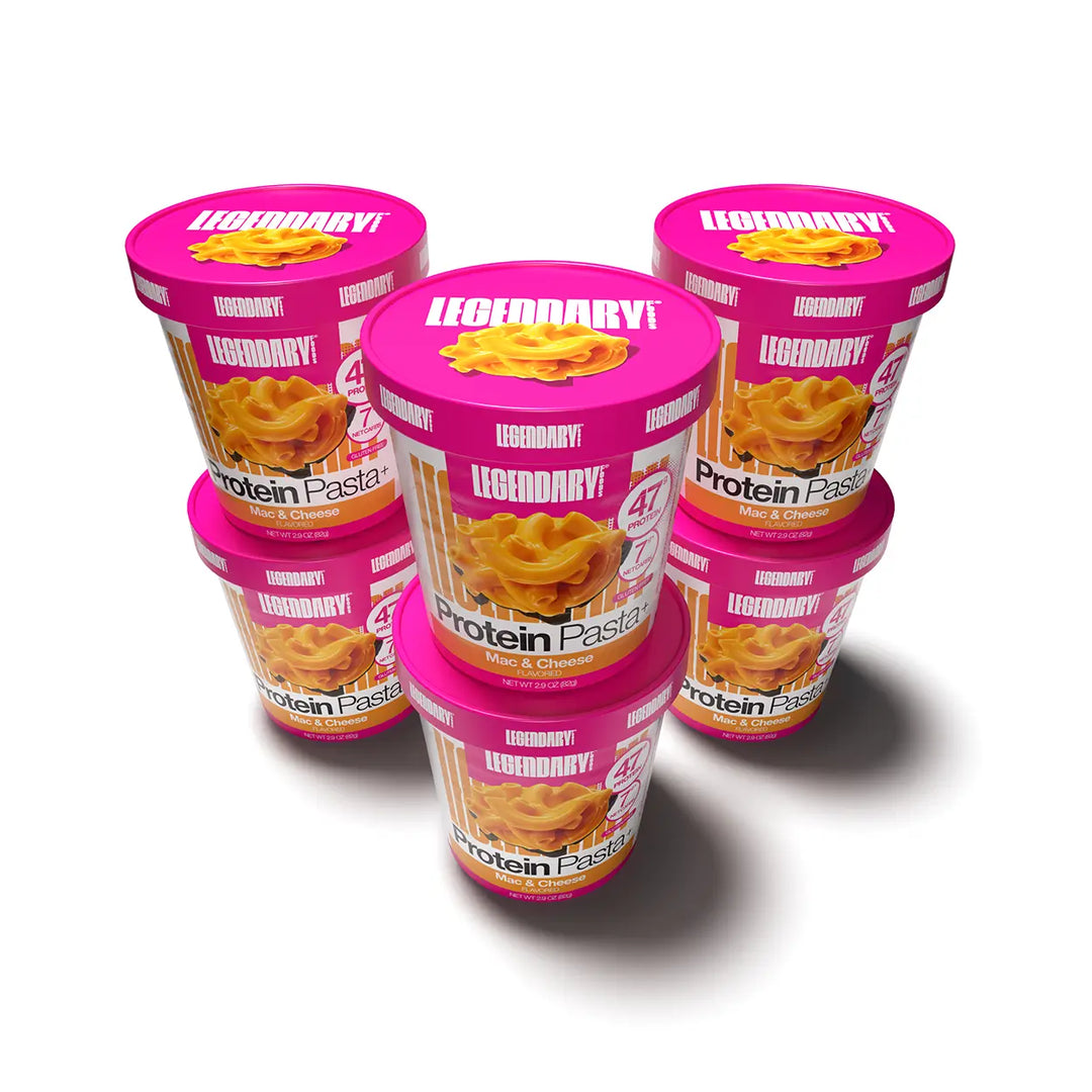 Six Legendary Foods mac and cheese protein pasta cups arranged together on a white background.