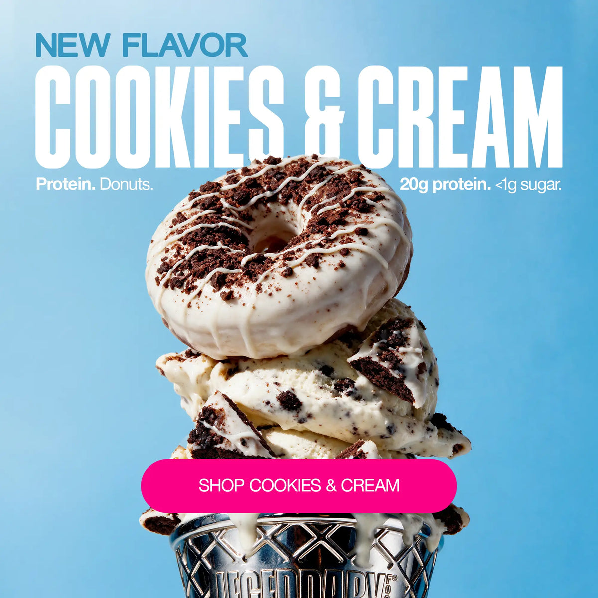 Cookies & Cream Legendary Protein Donut with white icing, chocolate cookie crumbles and drizzle, stacked over cookies-and-cream ice cream. Text reads “New Flavor Cookies & Cream,” “20g protein,” and “<1g sugar.”