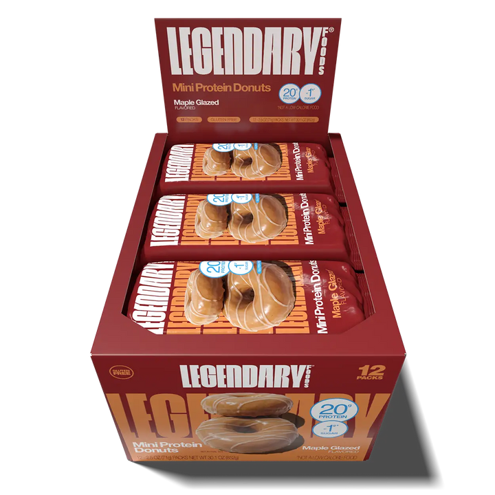 Open 12-pack box of Legendary Foods Maple Glazed Mini Protein Donuts with individually wrapped donut packs inside.