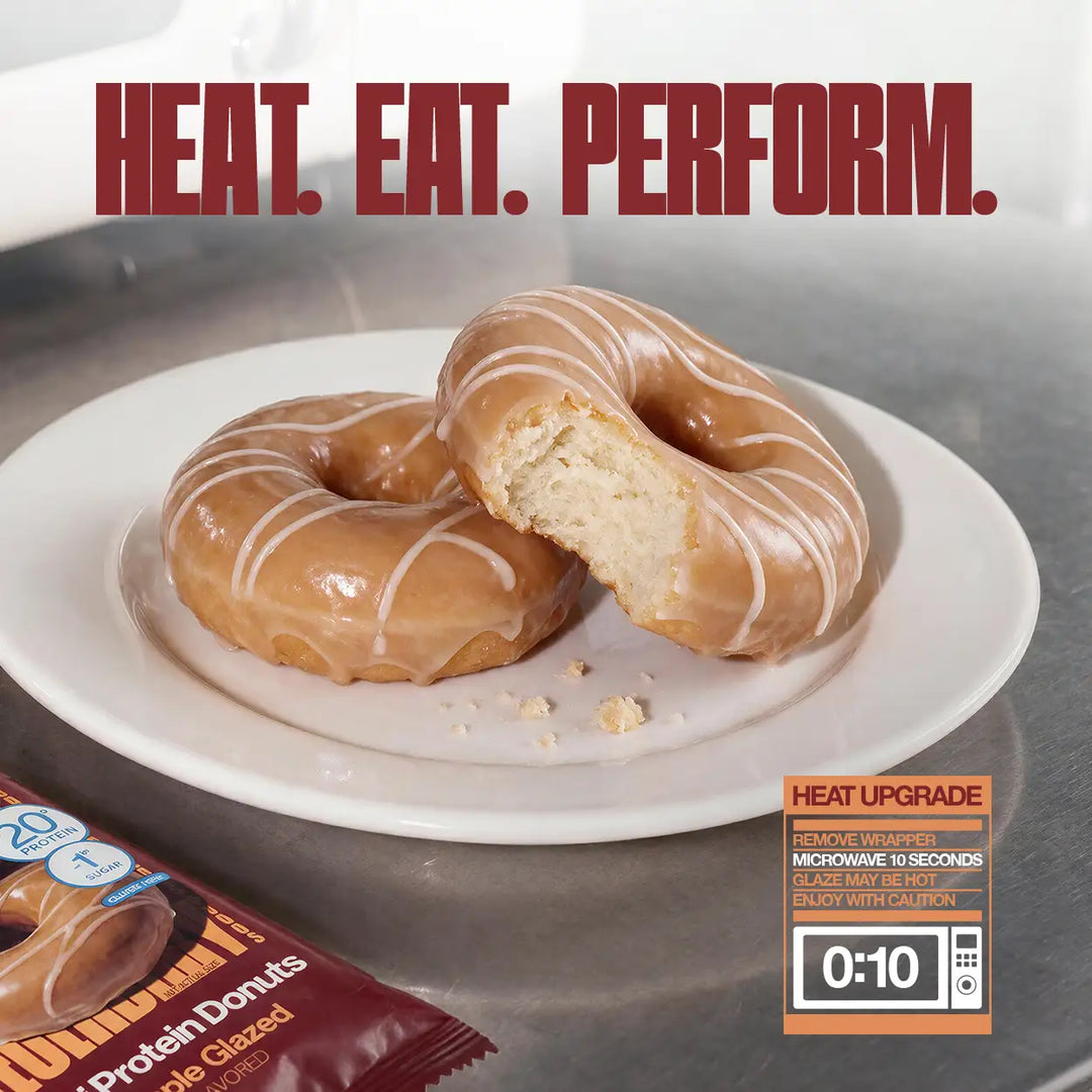 Legendary Foods Maple Glazed Mini Protein Donuts on a plate, including one cut open to show the interior, with 10-second microwave heating instructions.