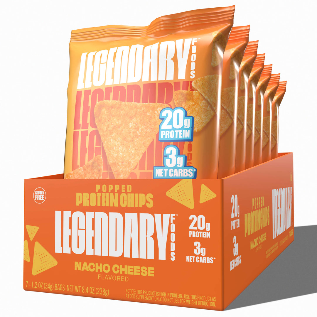 Box display of Legendary Foods Nacho Cheese Popped Protein Chips, highlighting 20g protein and 3g net carbs on bright orange packaging.