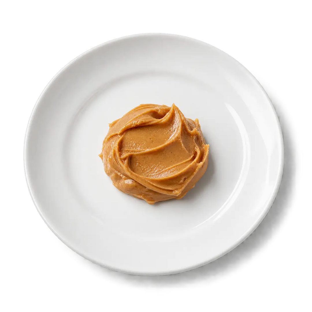 image of peanut butter on a white plate