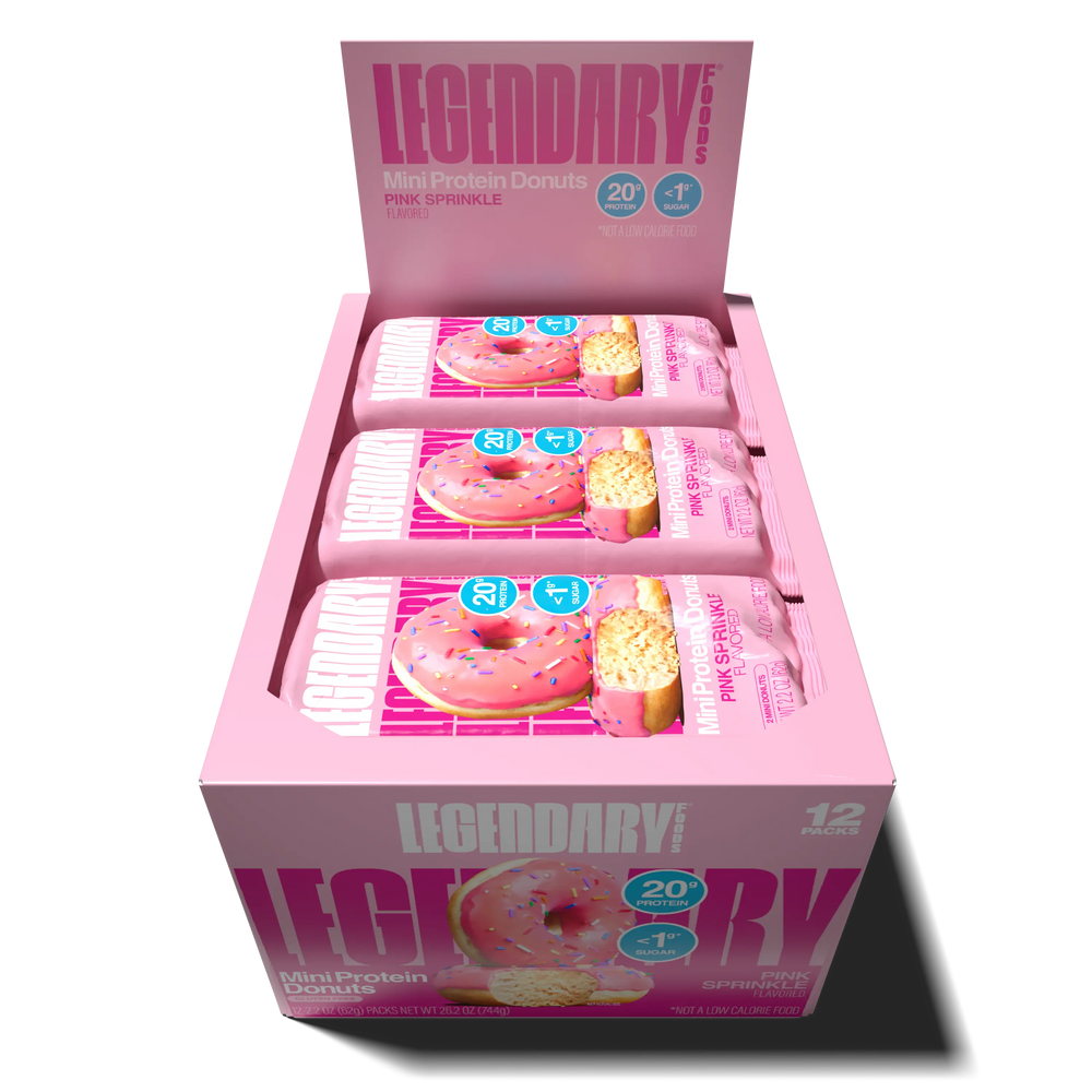 Top down view of an open box of Legendary Foods Pink Sprinkle Mini Protein Donuts