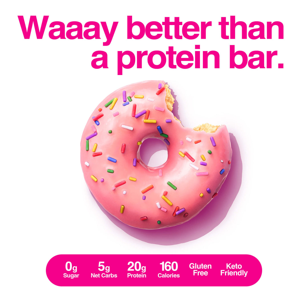 Pink sprinkled protein donut with a bite taken out, caption reads "Waaay better than a protein bar" with nutrition icons below.