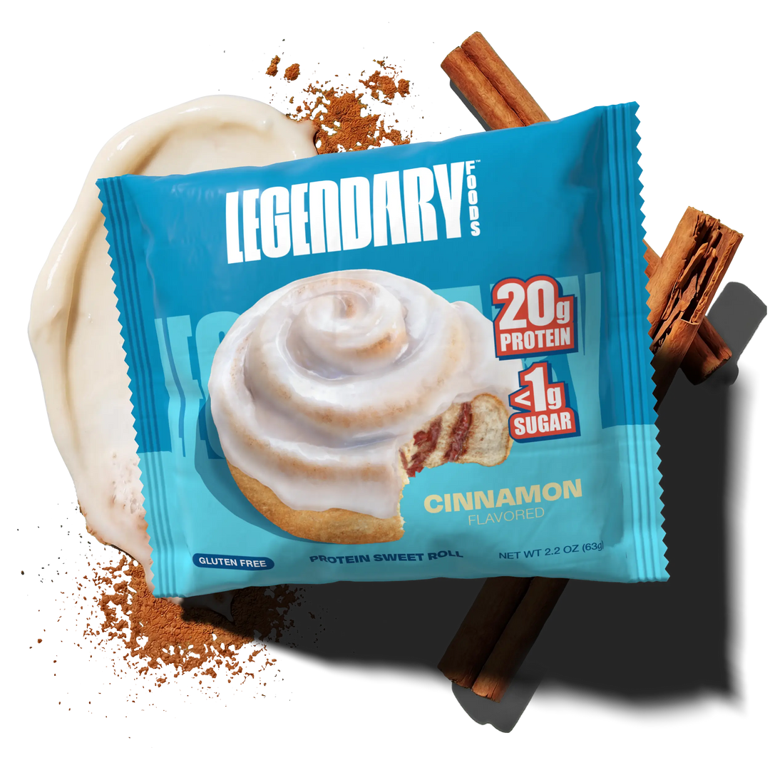 Blue package of Legendary Cinnamon protein sweet roll with cinnamon sticks and powder on a white background