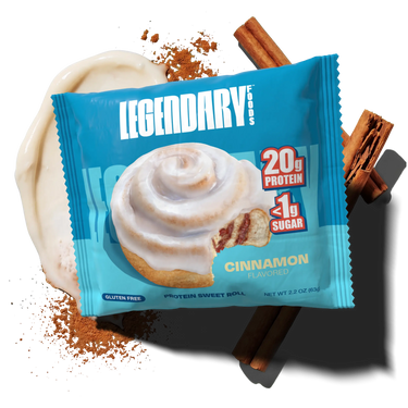 Blue package of Legendary Cinnamon protein sweet roll with cinnamon sticks and powder on a white background