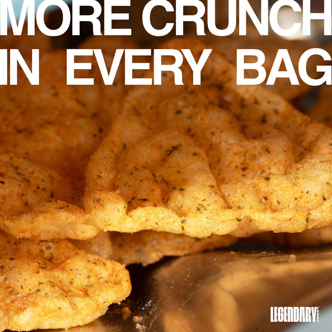 Close-up of Ranch protein chips inside a bag with bold text saying "More Crunch In Every Bag."