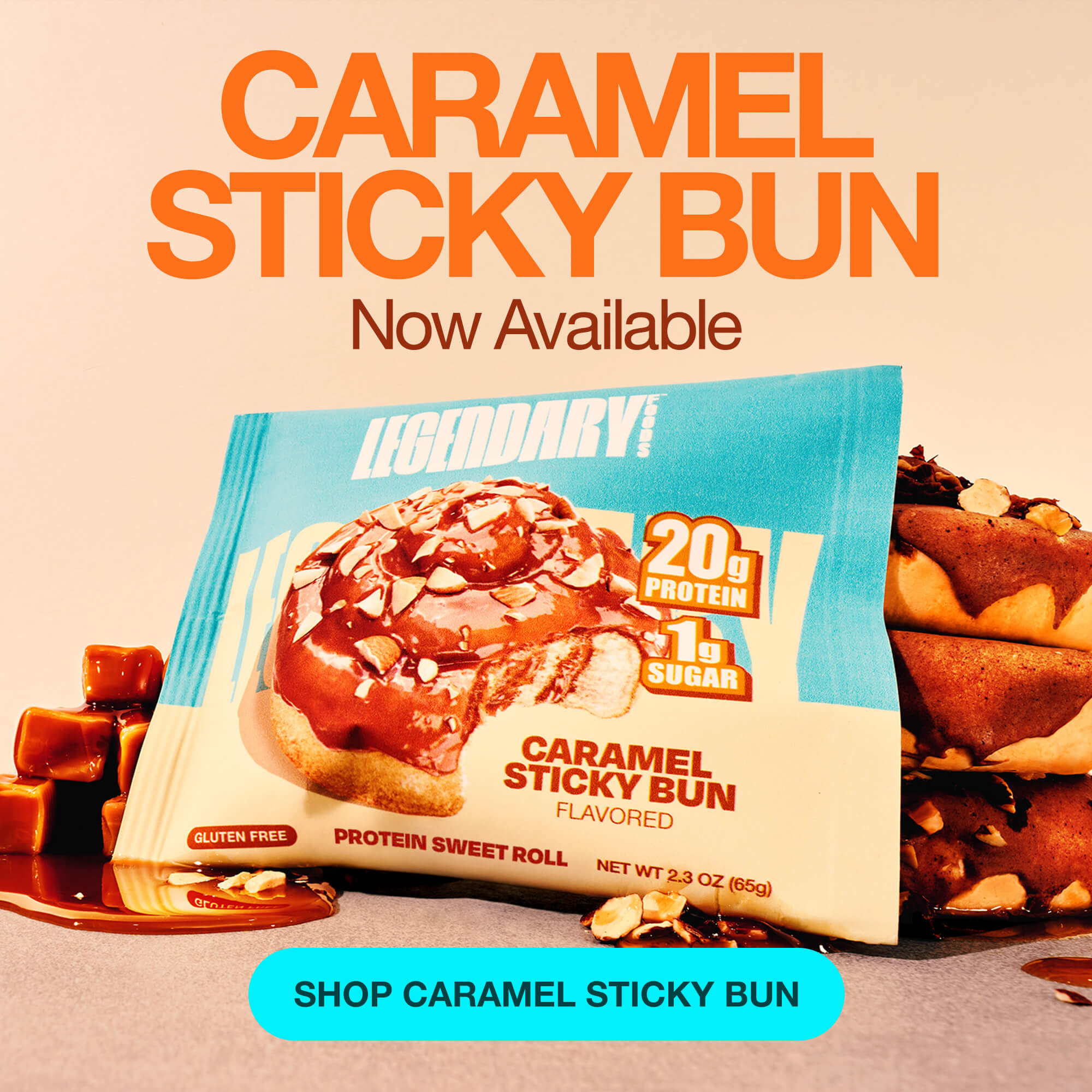 Protein caramel sticky bun in packaging with caramel drizzle, almonds, and product details. Text reads: 'Caramel Sticky Bun Now Available